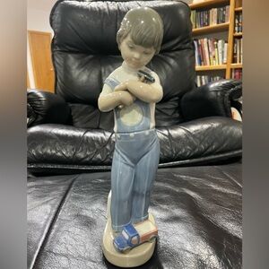 Lladro vintage mechanic boy with hammer,dice& truck figurine